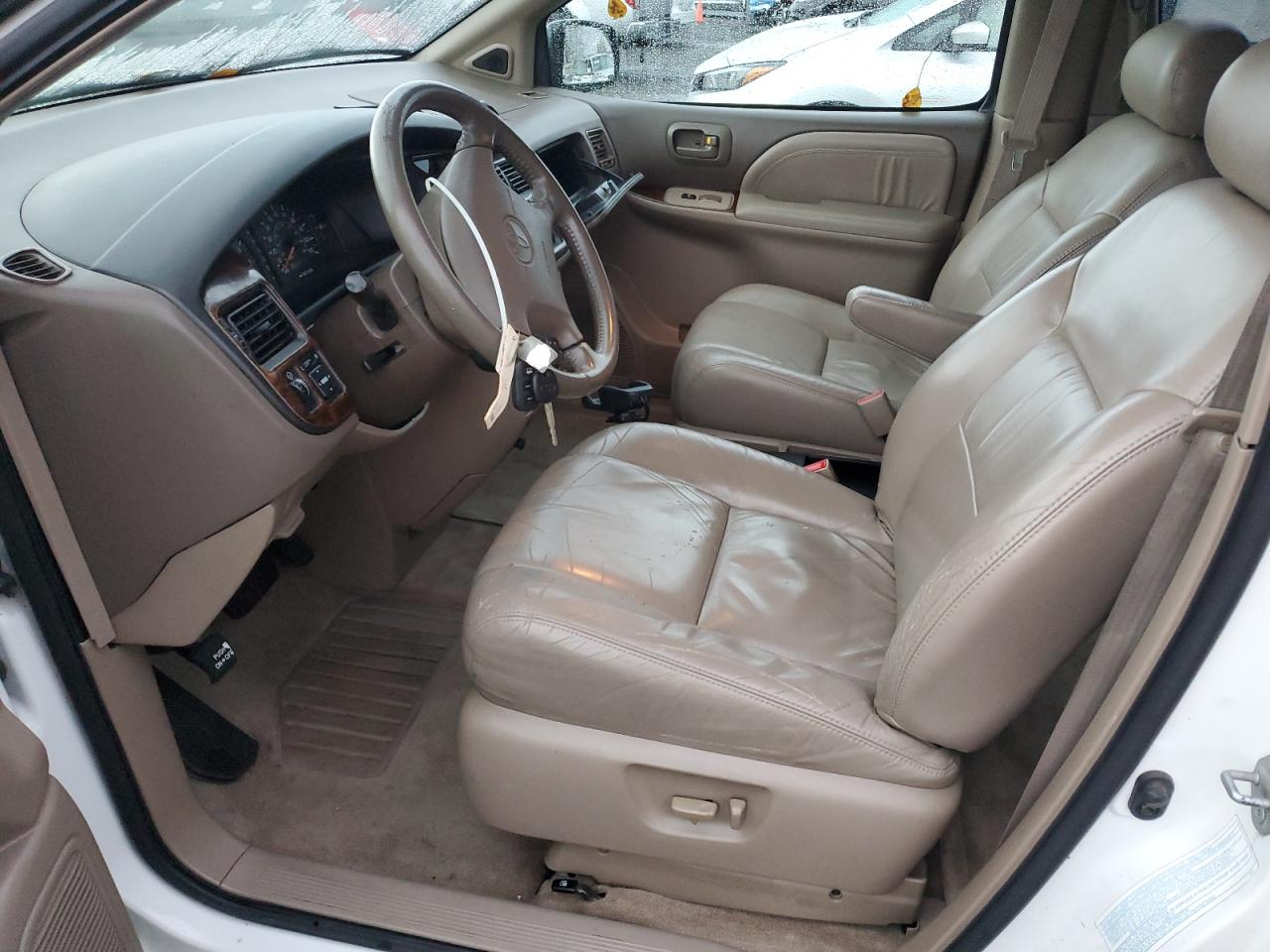 2000 Toyota Sienna Le VIN: 4T3ZF13C4YU242234 Lot: 91557675