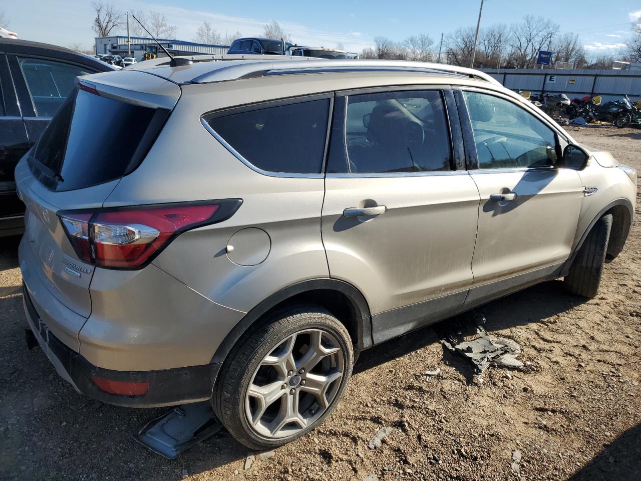 2017 Ford Escape Titanium VIN: 1FMCU0J9XHUA49107 Lot: 79437323