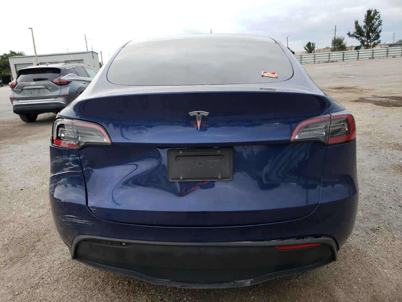 2023 Tesla Model Y VIN: 7SAYGAEE9PF607117 Lot: 81387353