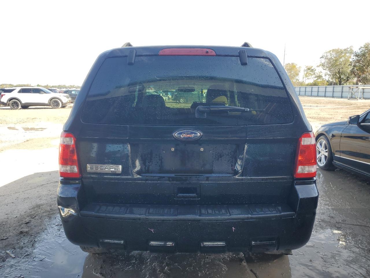 2010 Ford Escape Xlt VIN: 1FMCU0D77AKC71275 Lot: 82535203