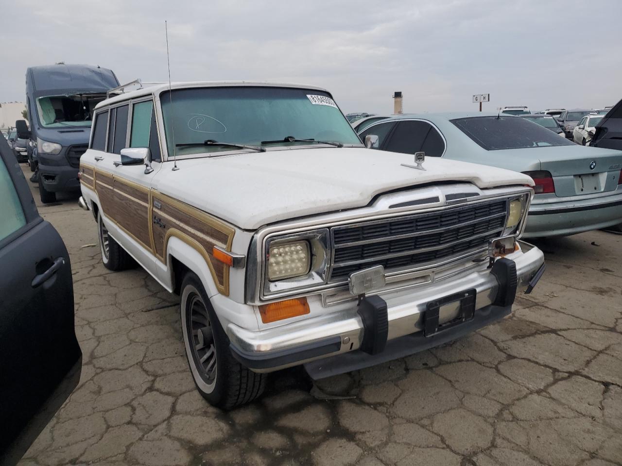 1990 Jeep Grand Wagoneer VIN: 1J4GS5870LP505338 Lot: 81645503