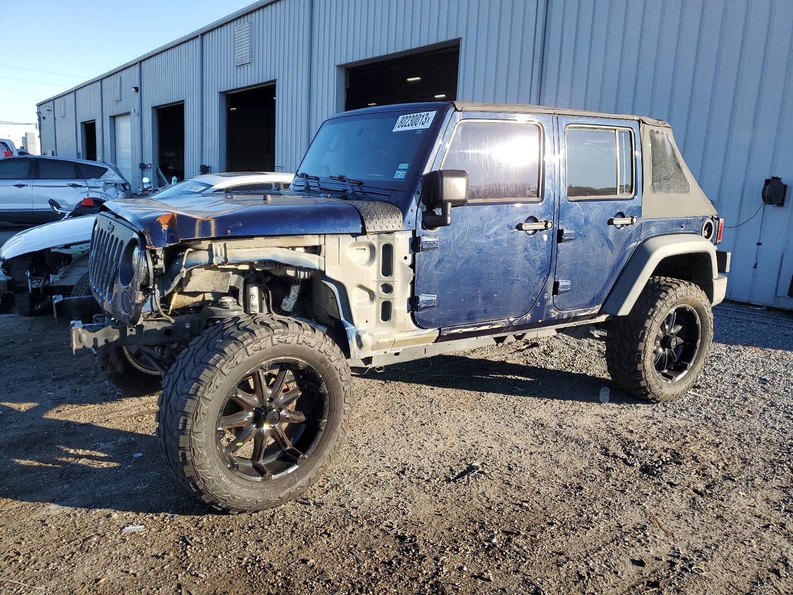 2013 Jeep Wrangler Unlimited Sport vin: 1C4BJWDG2DL527090