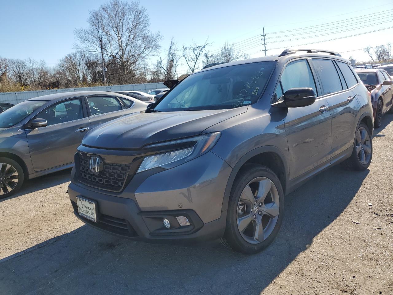 2019 Honda Passport Touring VIN: 5FNYF8H97KB003212 Lot: 80778563