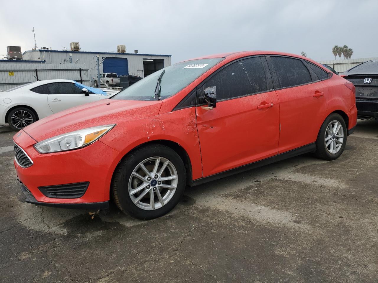 VIN 1FADP3F21HL300296 2017 FORD FOCUS no.1