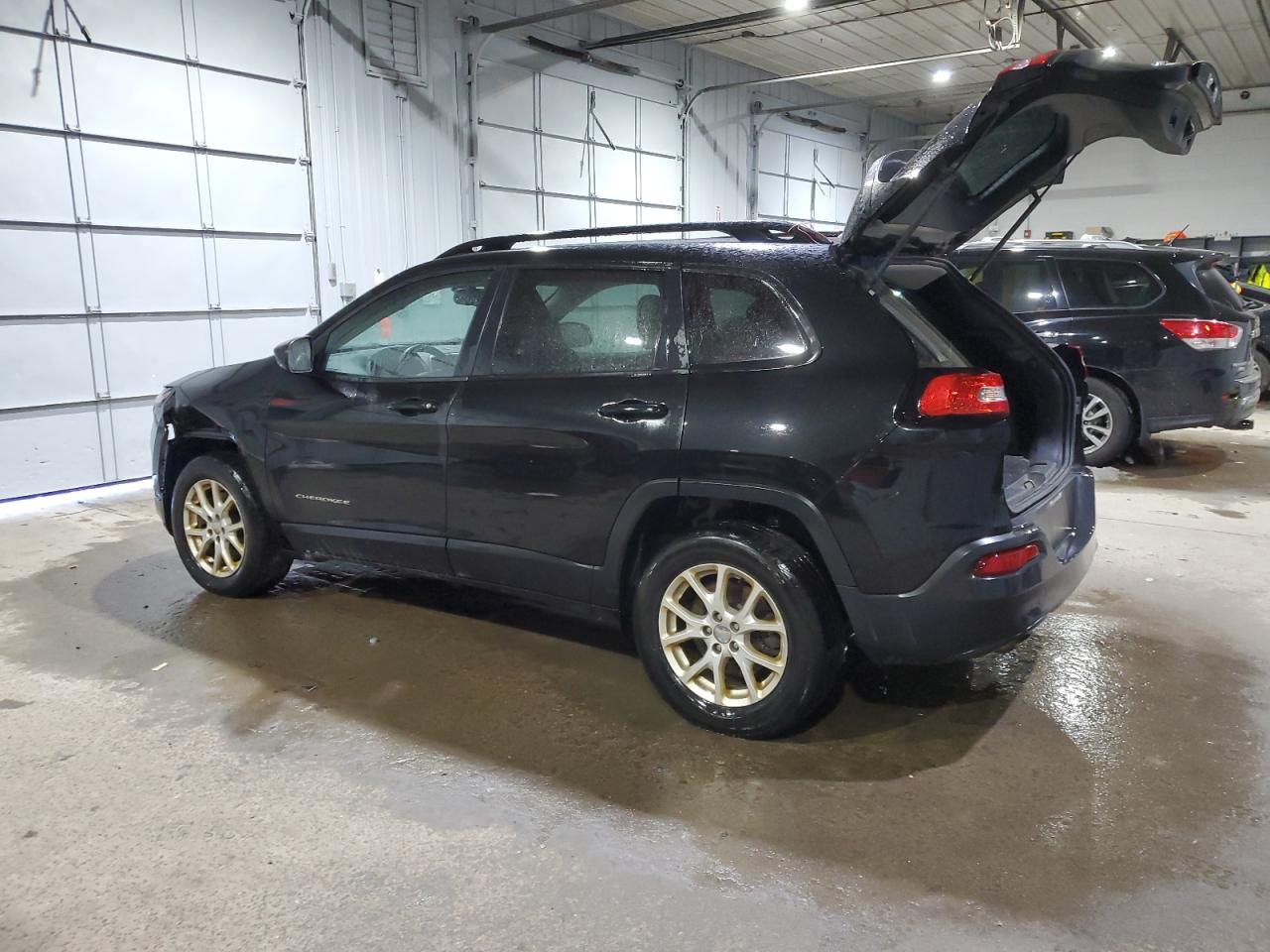 2016 Jeep Grand Cherokee - Image 2