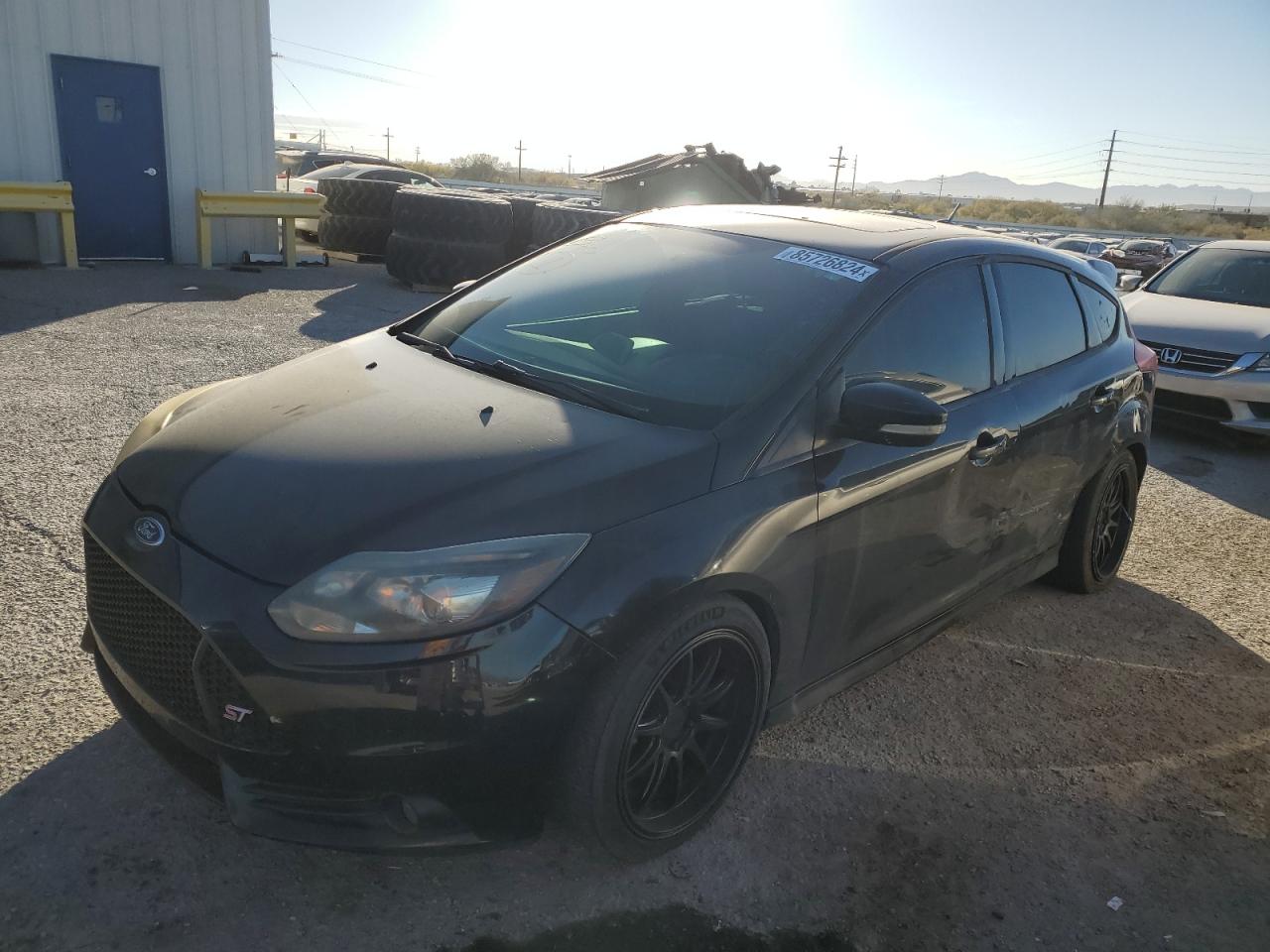 VIN 1FADP3L91DL202008 2013 FORD FOCUS no.1