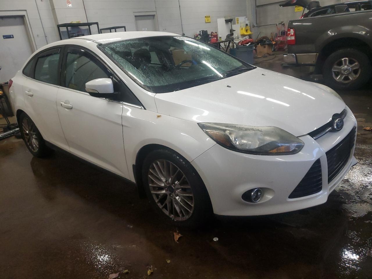 VIN 1FADP3J29EL232378 2014 FORD FOCUS no.4