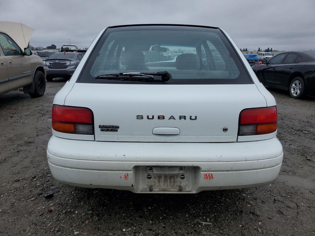 1999 Subaru Impreza L VIN: JF1GF4356XH802498 Lot: 86748964