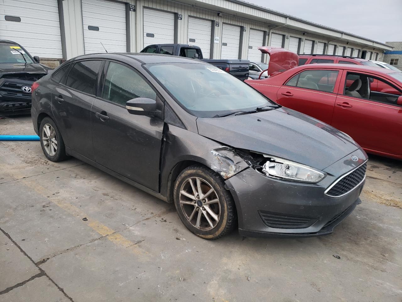 VIN 1FADP3F21FL325616 2015 FORD FOCUS no.4