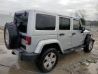 2012 Jeep Wrangler Unlimited Sahara на продаже в Louisville, KY - Front End