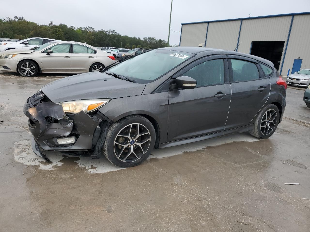 VIN 1FADP3K27FL279960 2015 FORD FOCUS no.1