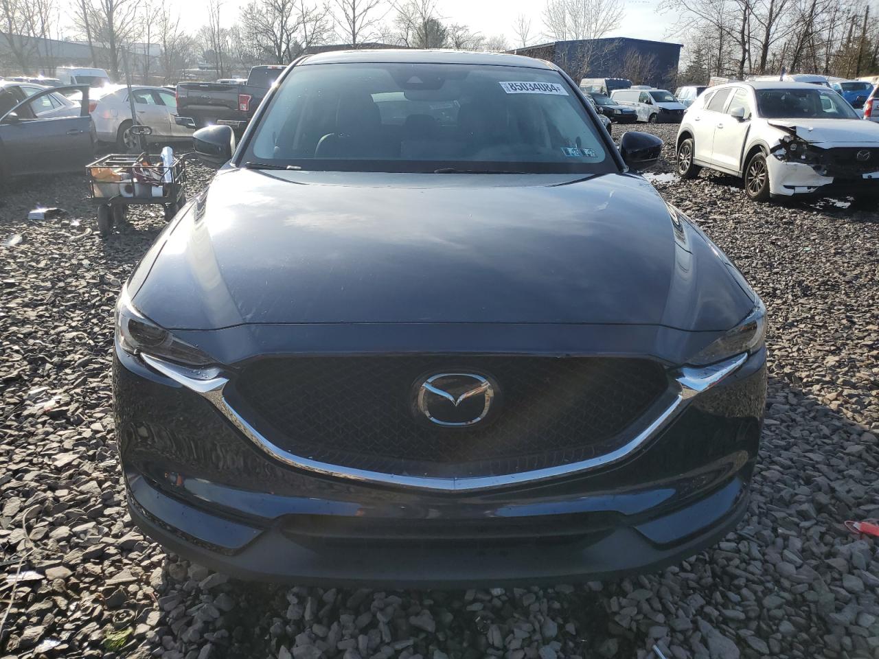 2021 Mazda Cx-5 Grand Touring Reserve VIN: JM3KFBAY4M0353975 Lot: 85034084