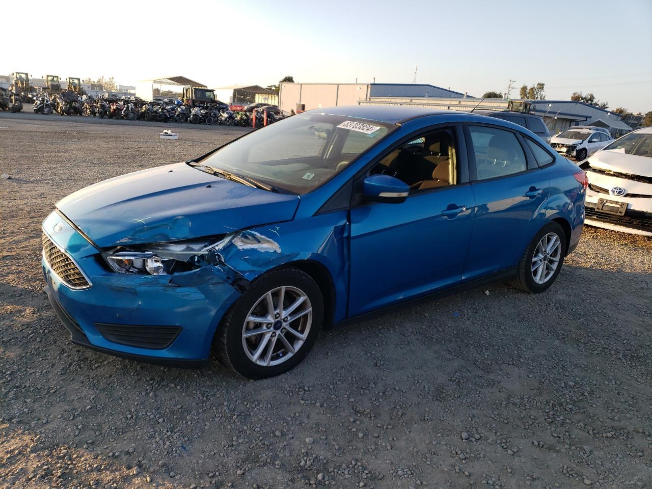 VIN 1FADP3F20FL228438 2015 FORD FOCUS no.1