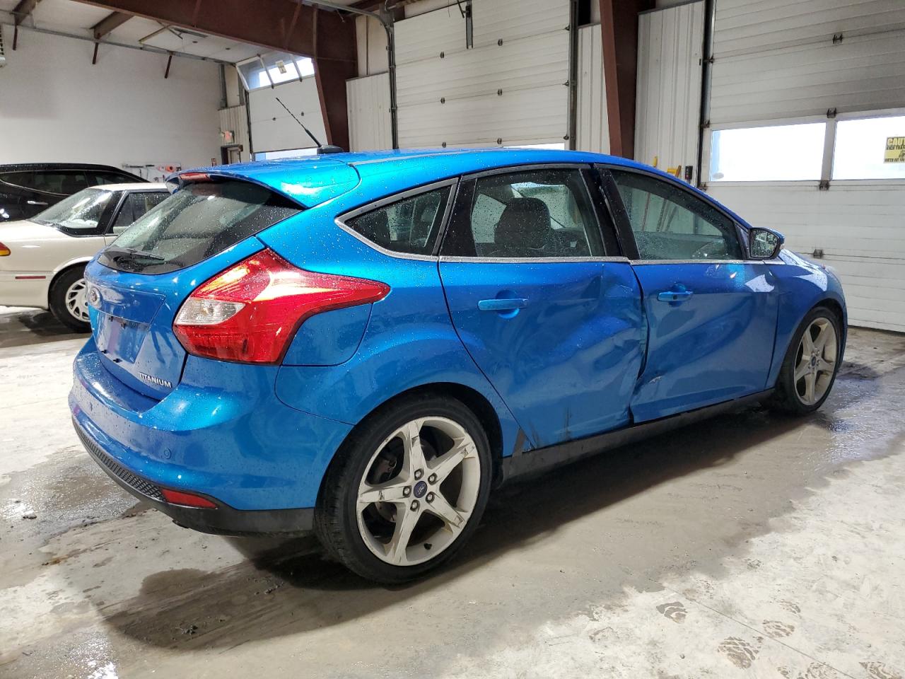 VIN 1FADP3N25EL422849 2014 FORD FOCUS no.3