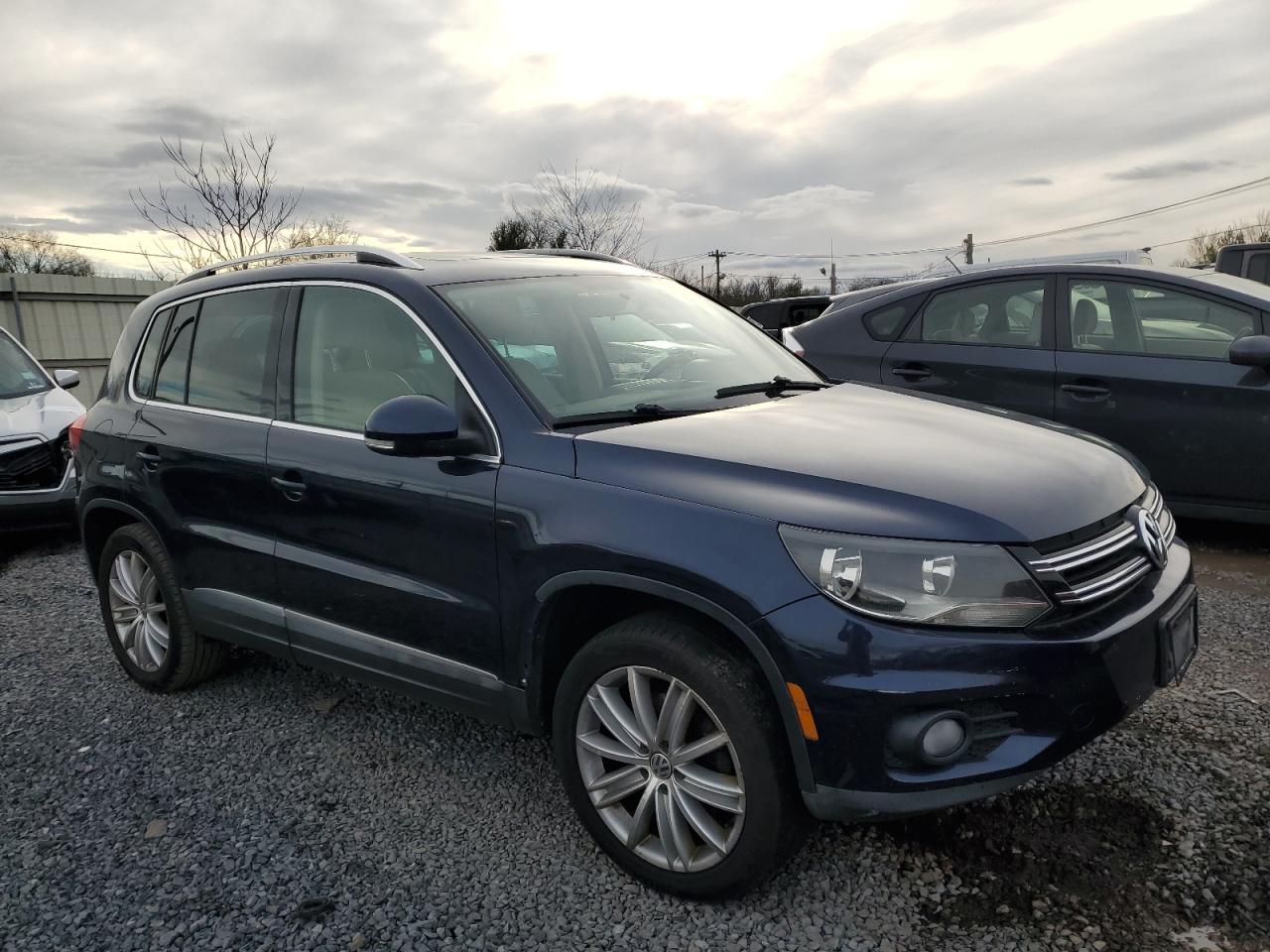 VIN WVGAV7AX6FW504211 2015 VOLKSWAGEN TIGUAN no.4