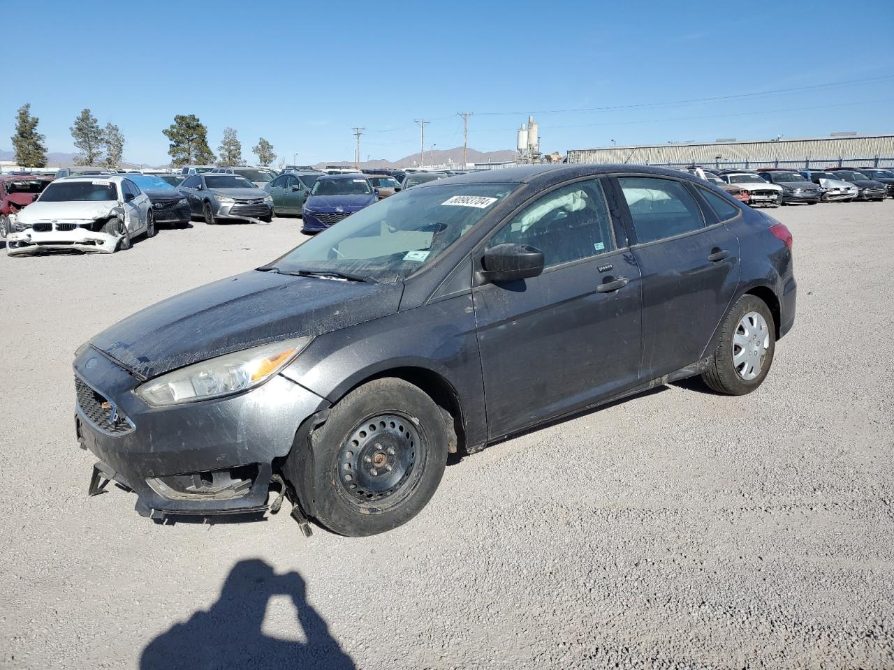 VIN 1FADP3E26GL207323 2016 FORD FOCUS no.1