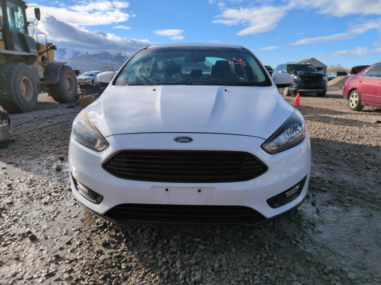 VIN 1FADP3FE8JL223555 2018 FORD FOCUS no.5