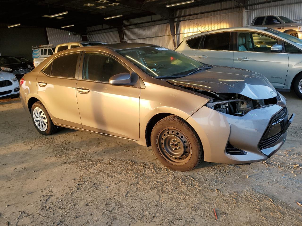 VIN 5YFBURHE3HP672962 2017 TOYOTA COROLLA no.4