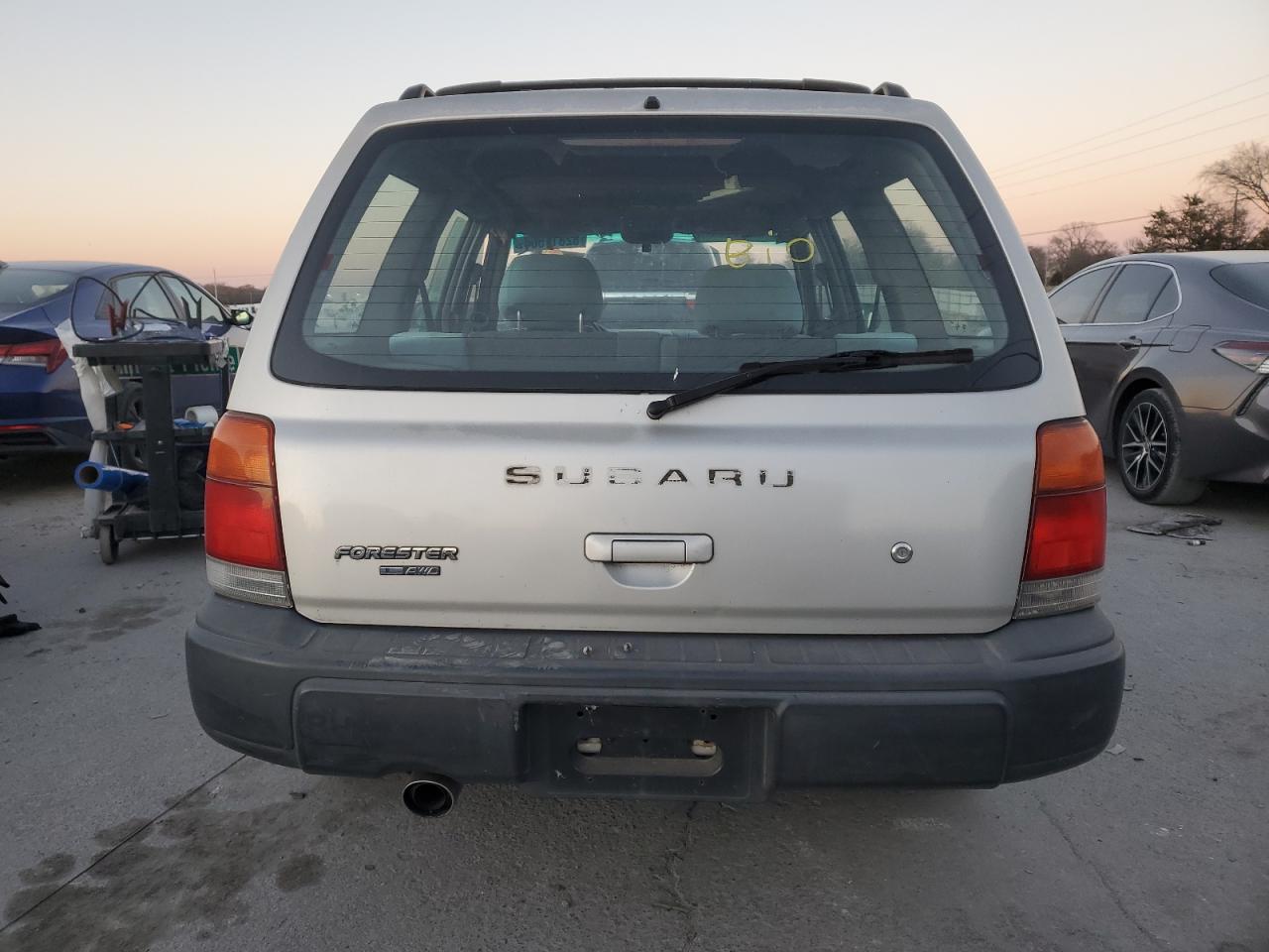 1999 Subaru Forester L VIN: JF1SF6353XH712909 Lot: 82811504