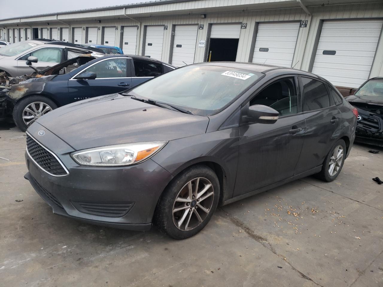 VIN 1FADP3F21FL325616 2015 FORD FOCUS no.1