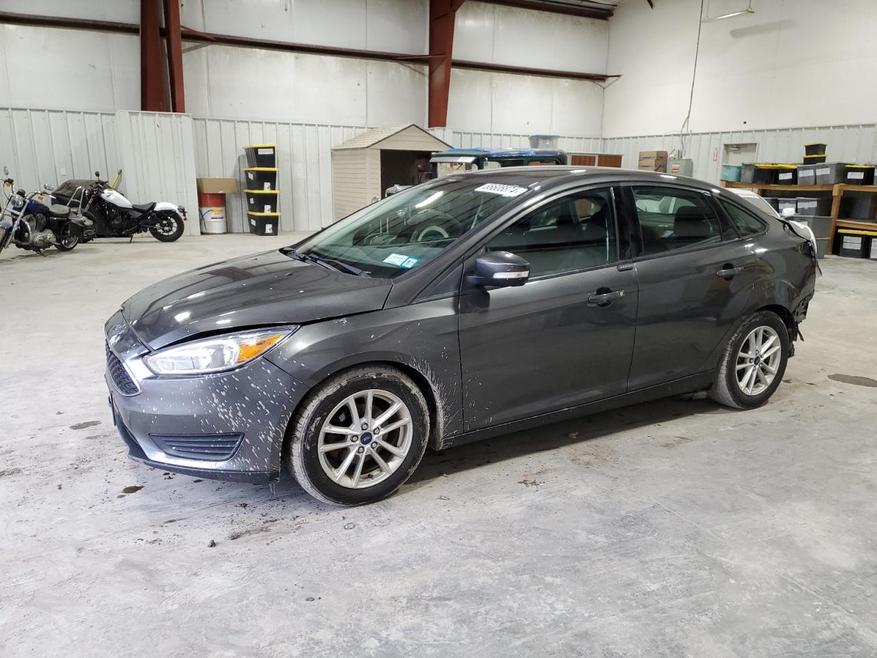 VIN 1FADP3F28FL377888 2015 FORD FOCUS no.1