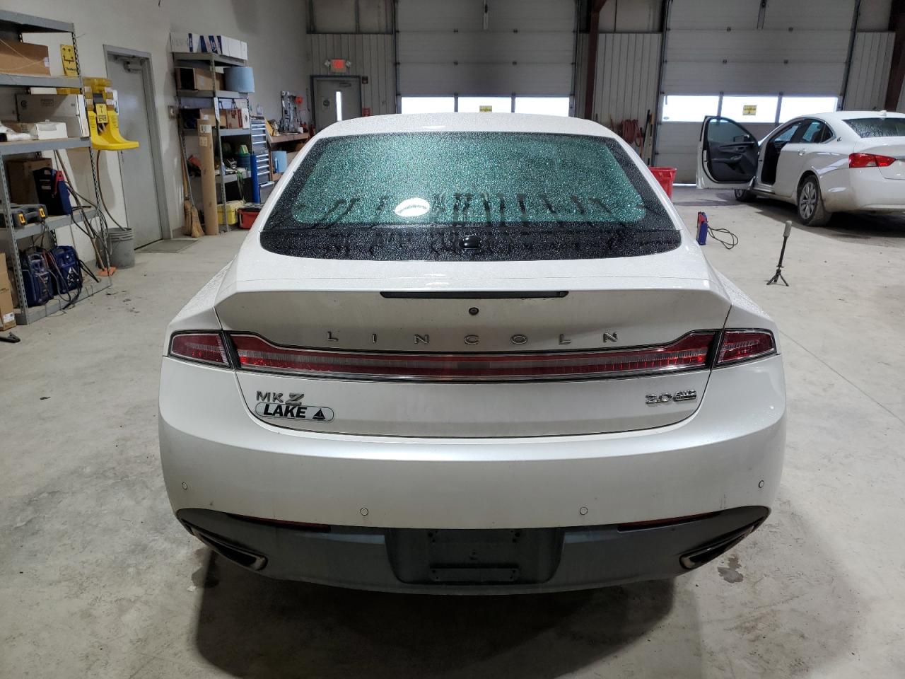 2016 Lincoln Mkz VIN: 3LN6L2J97GR631232 Lot: 83390564