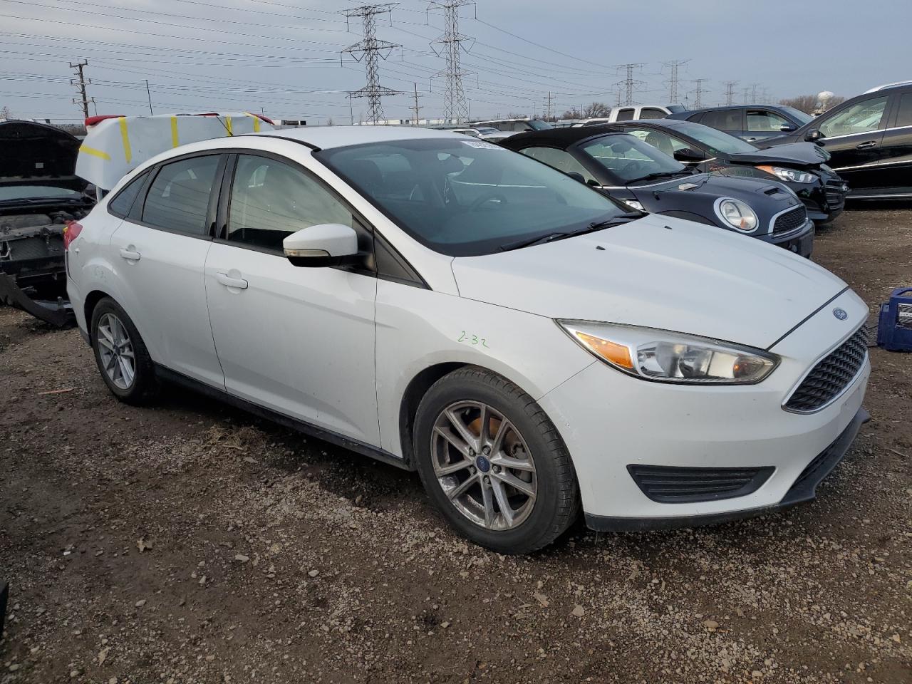 VIN 1FADP3F2XGL201670 2016 FORD FOCUS no.4