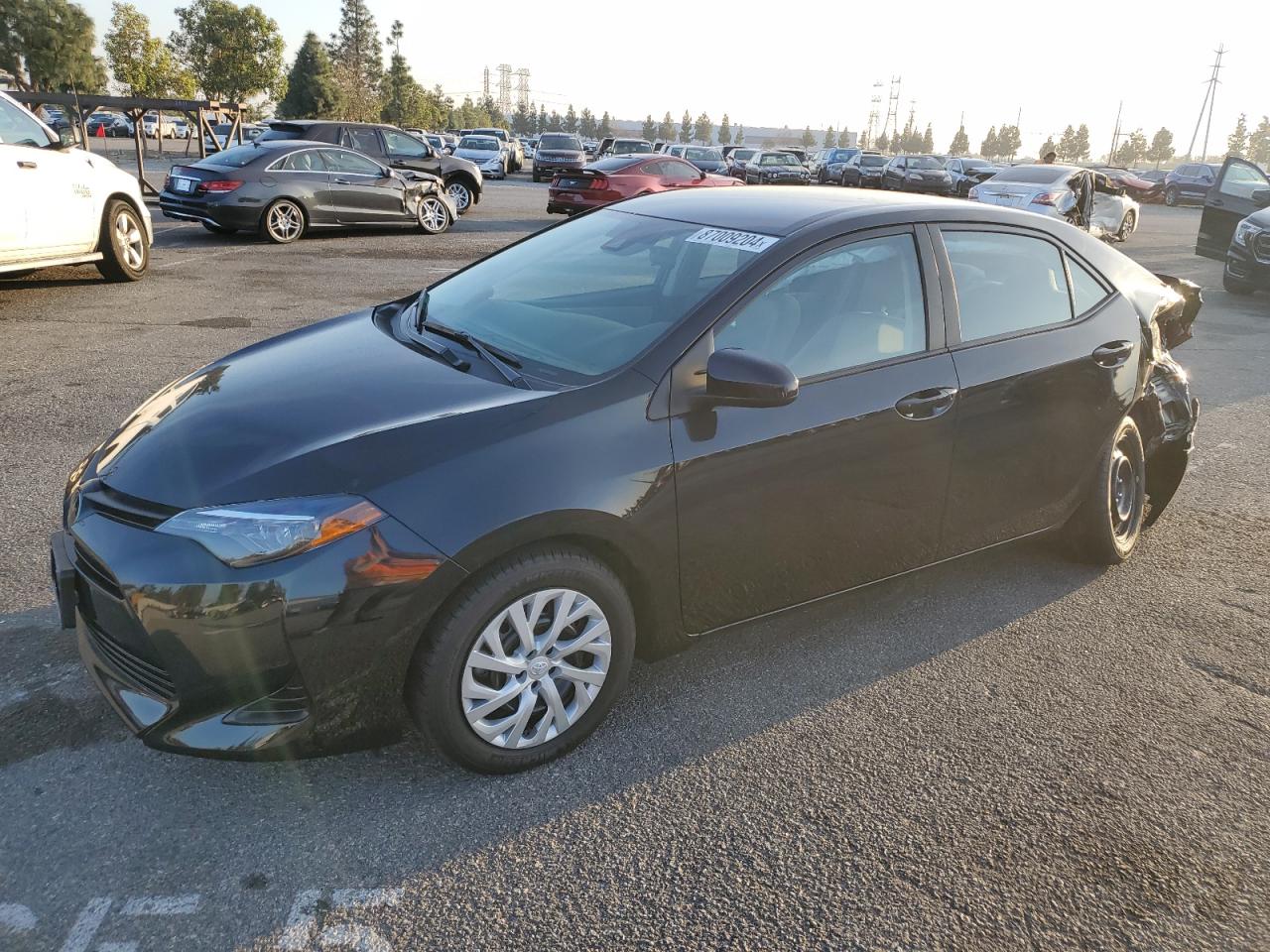 VIN 5YFBURHE5KP903061 2019 TOYOTA COROLLA no.1