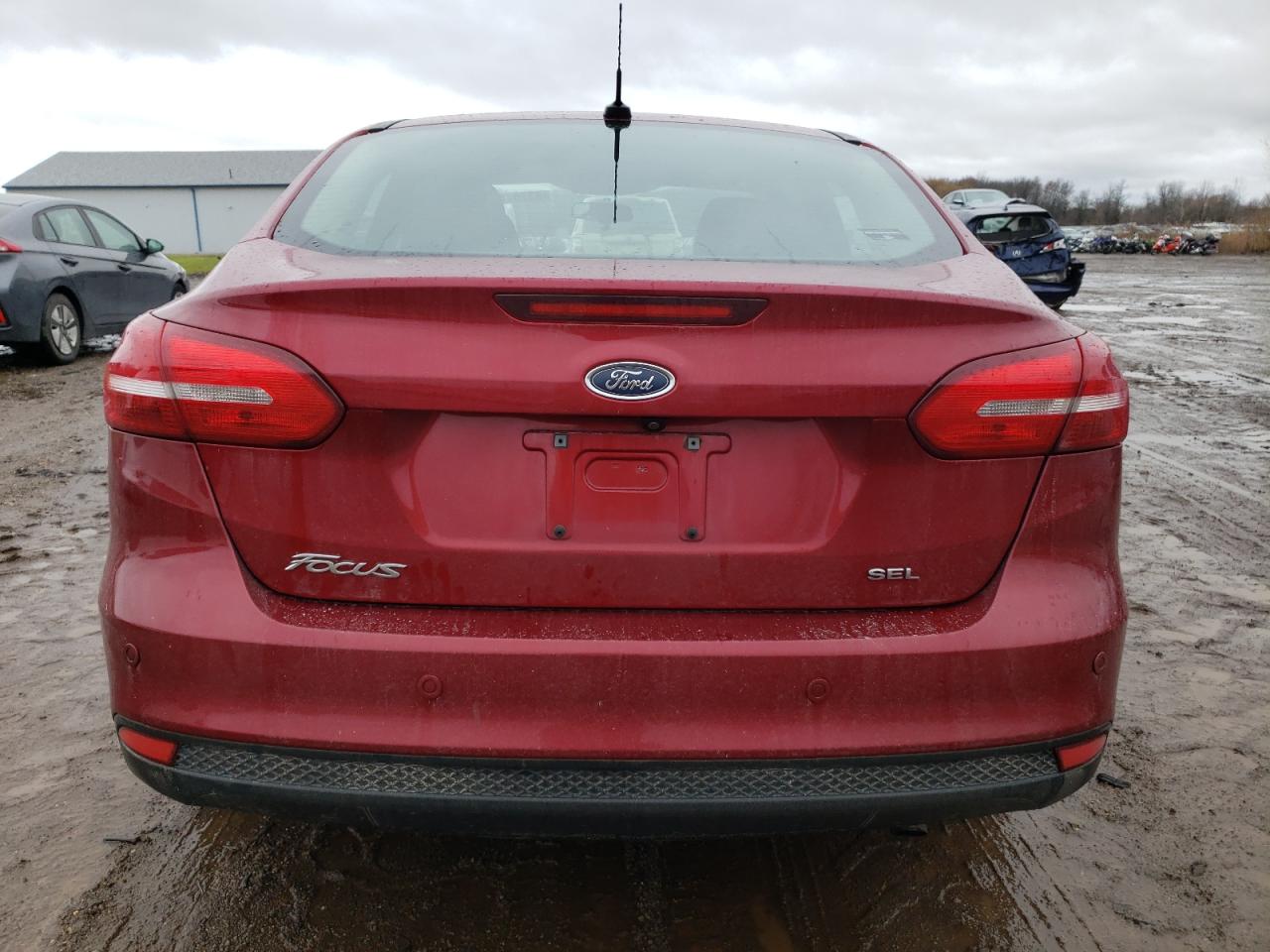 VIN 1FADP3H26HL306902 2017 FORD FOCUS no.6