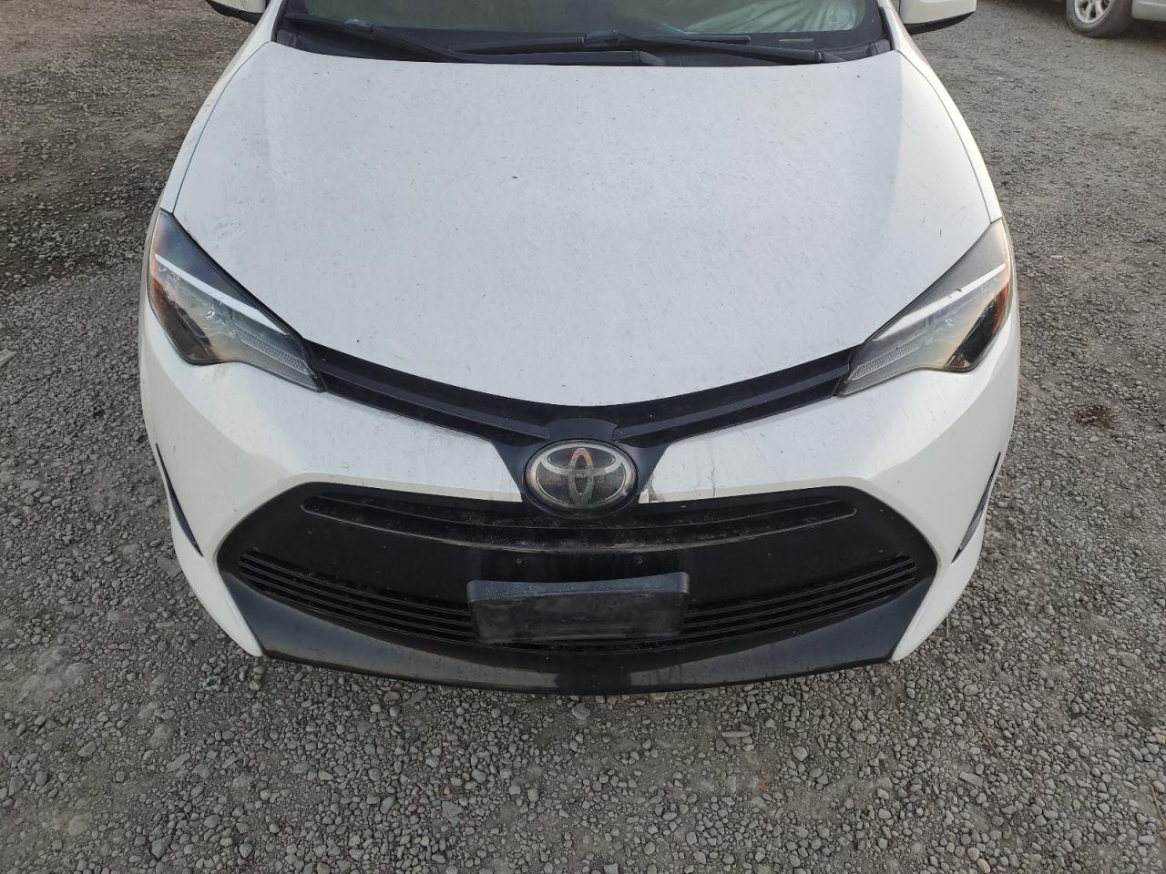 2018 Toyota Corolla L VIN: 5YFBURHE8JP799485 Lot: 87011354
