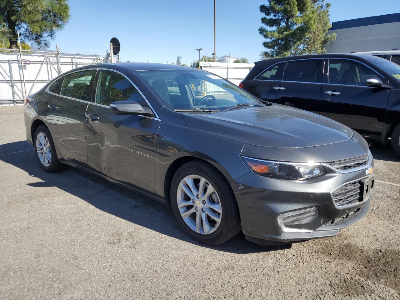 VIN 1G1ZD5ST8JF233373 2018 CHEVROLET MALIBU no.4