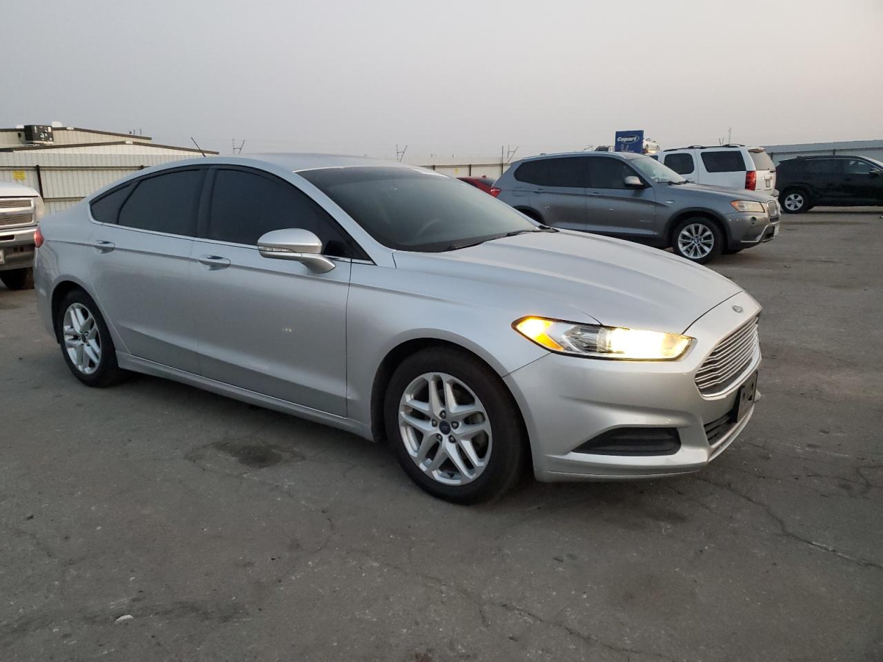 VIN 3FA6P0H78GR282606 2016 FORD FUSION no.4