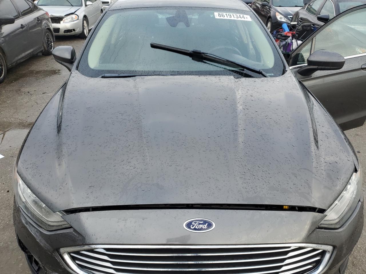 VIN 3FA6P0LU4KR110496 2019 FORD FUSION no.11