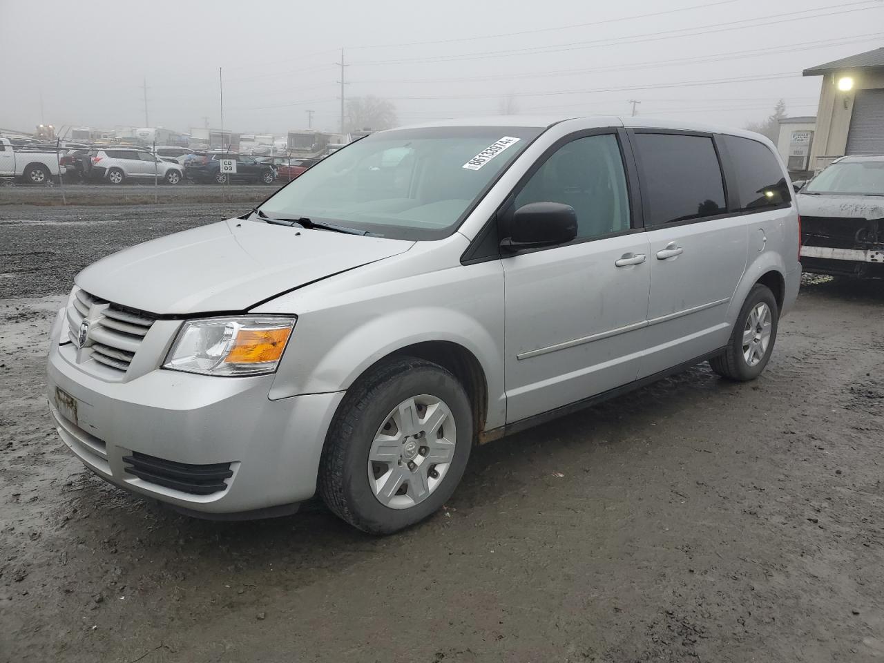 2009 Dodge Caravan - Image 1