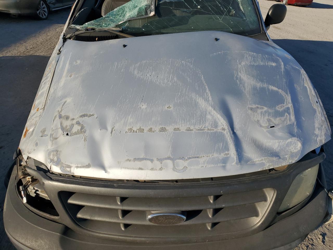 2003 Ford F150 VIN: 1FTRF18233NA90611 Lot: 70284375