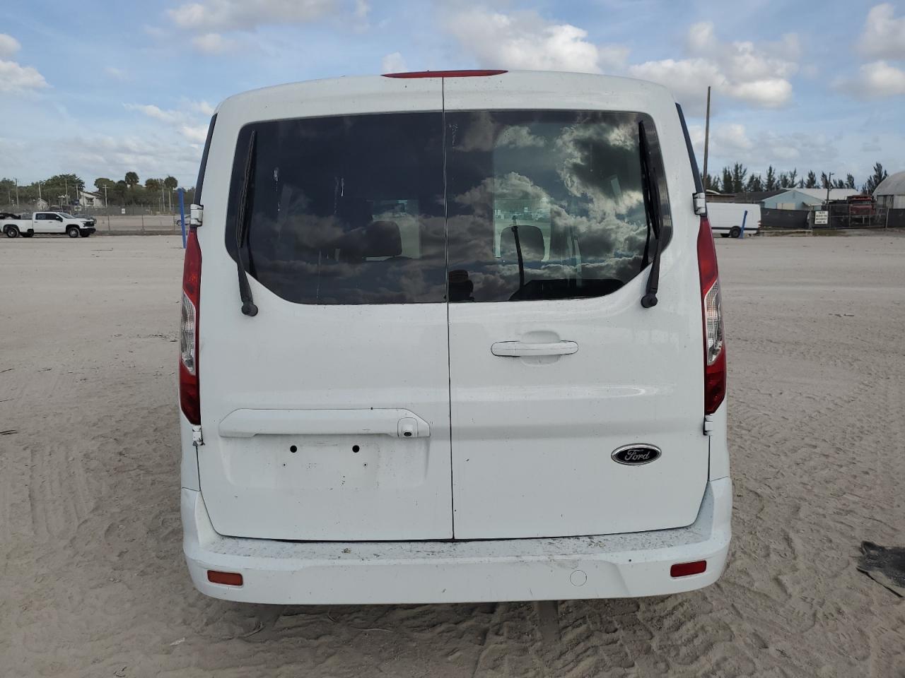 2014 Ford Transit Connect Xlt VIN: NM0AS8F79E1144856 Lot: 84394694