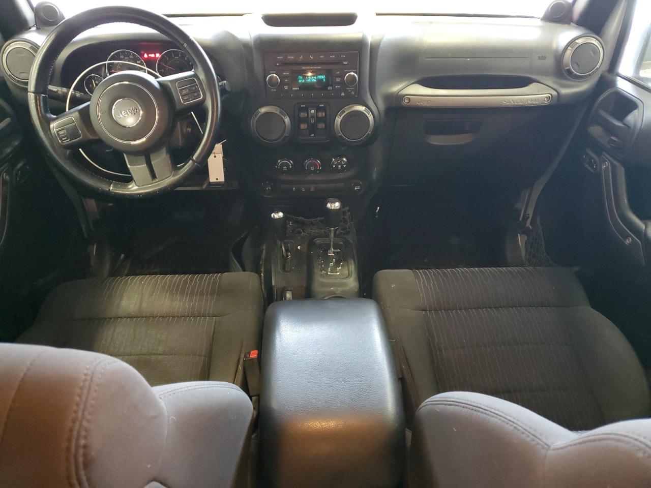 2012 Jeep Wrangler Unlimited Sport VIN: 1C4HJWDG1CL248710 Lot: 85690634