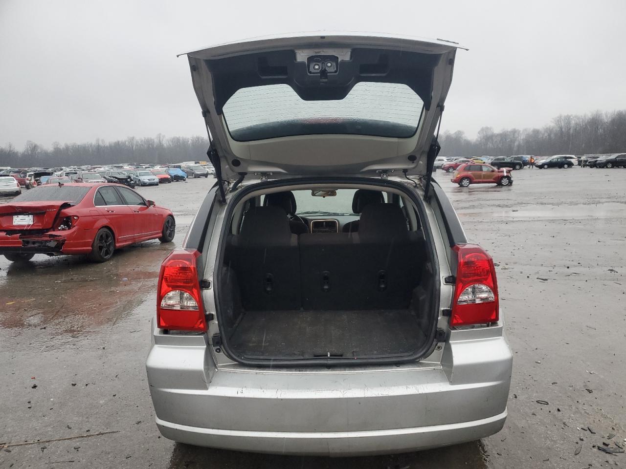 2010 Dodge Caliber Sxt VIN: 1B3CB4HA5AD652314 Lot: 85770924