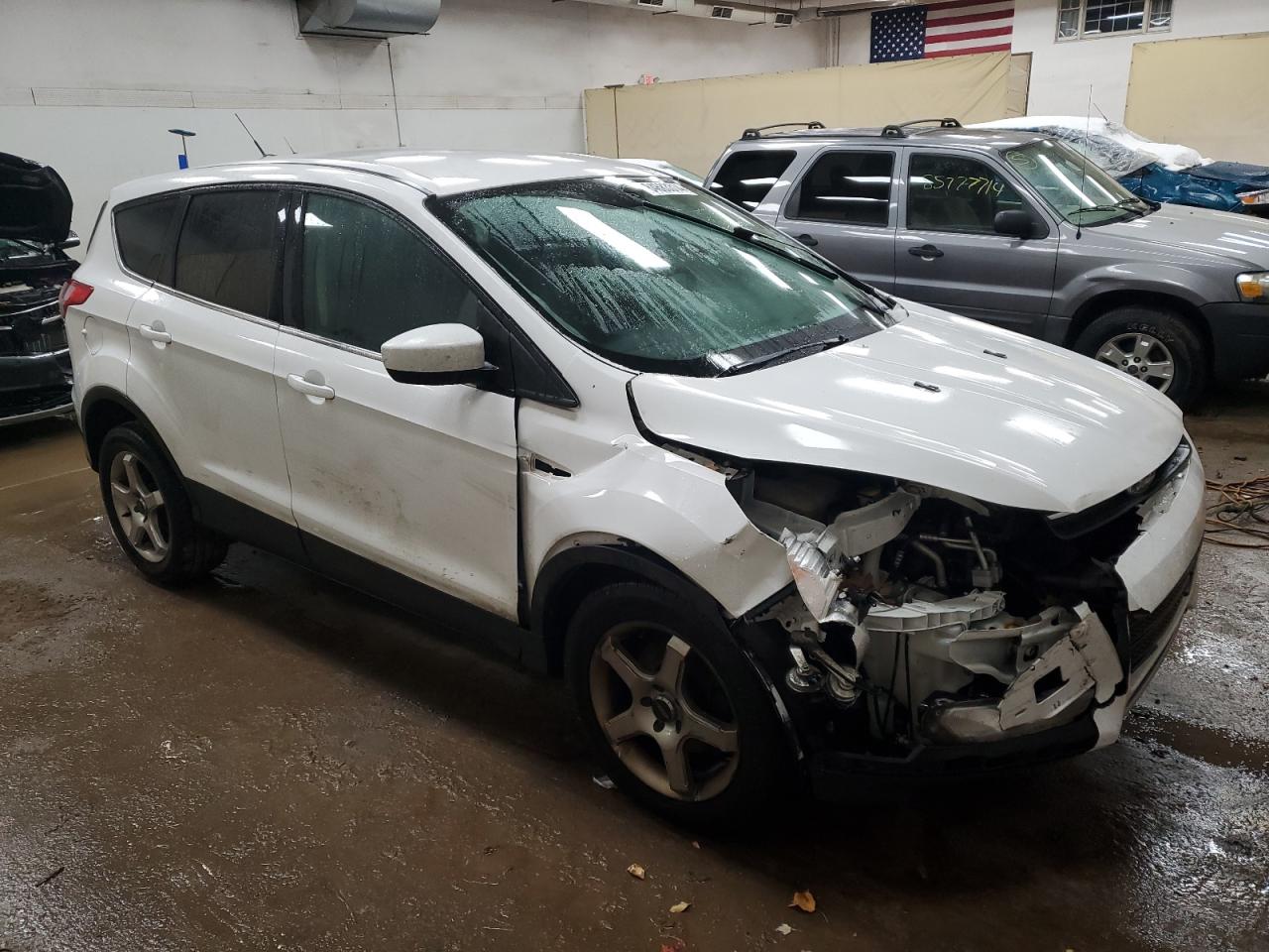 VIN 1FMCU0GX0FUA40516 2015 FORD ESCAPE no.4