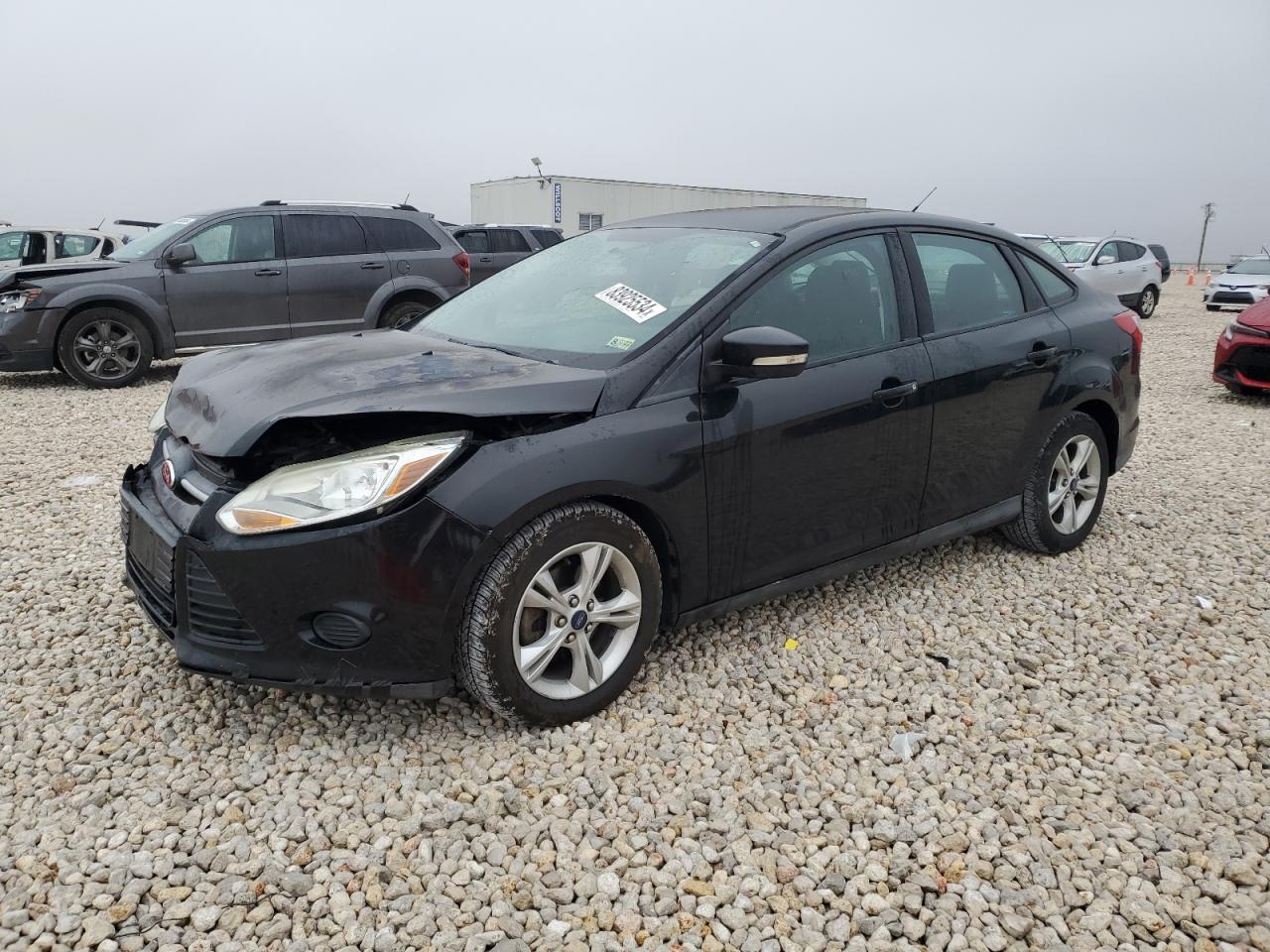 VIN 1FADP3F22DL354958 2013 FORD FOCUS no.1