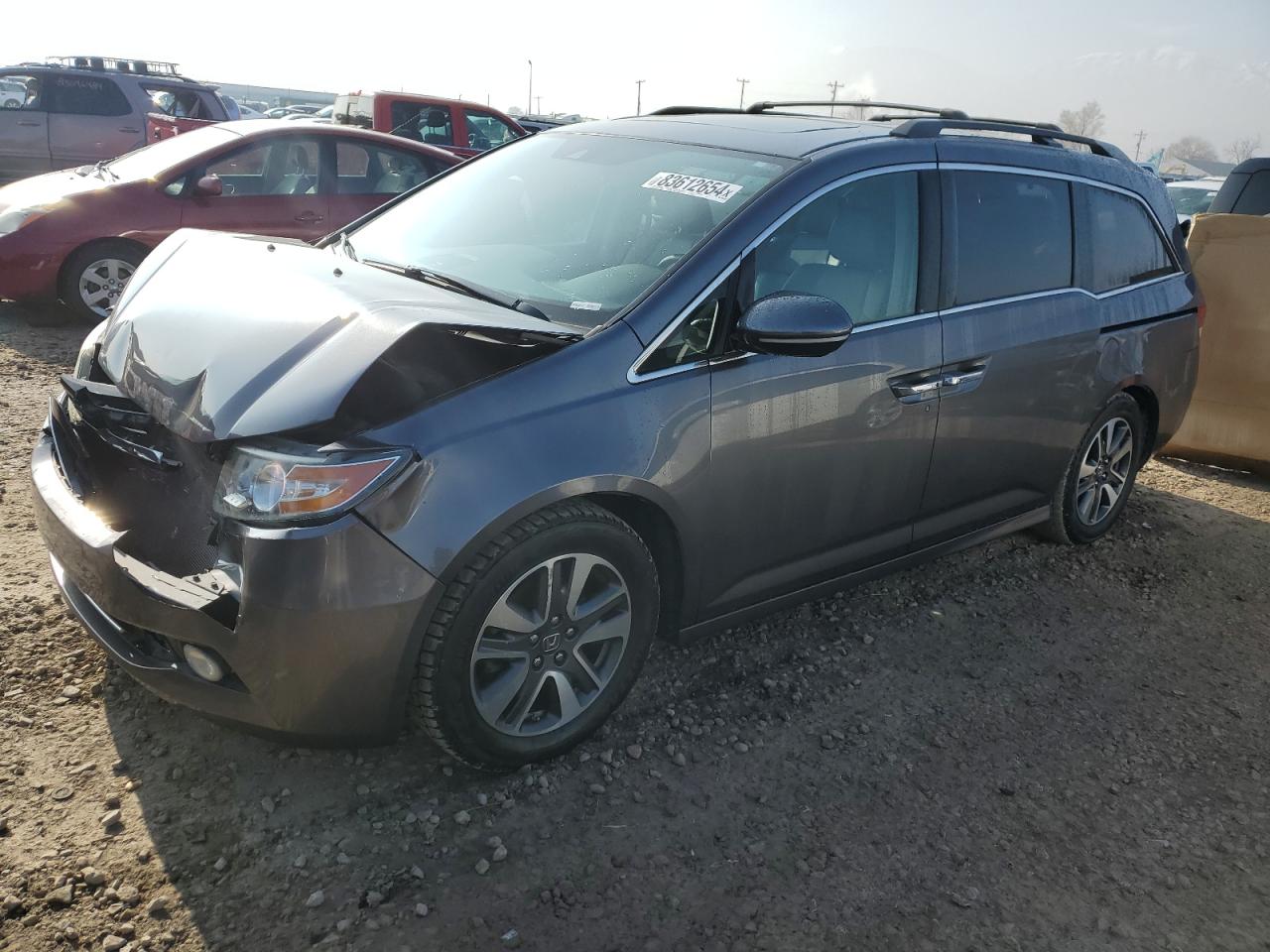 2015 Honda Odyssey Touring на продаже в Magna, UT - Front End