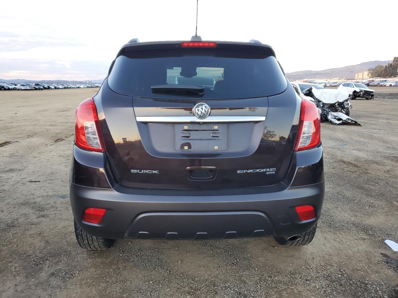 2015 BUICK ENCORE with MINOR DENT/SCRATCHES damage, VIN KL4CJGSB6FB000092