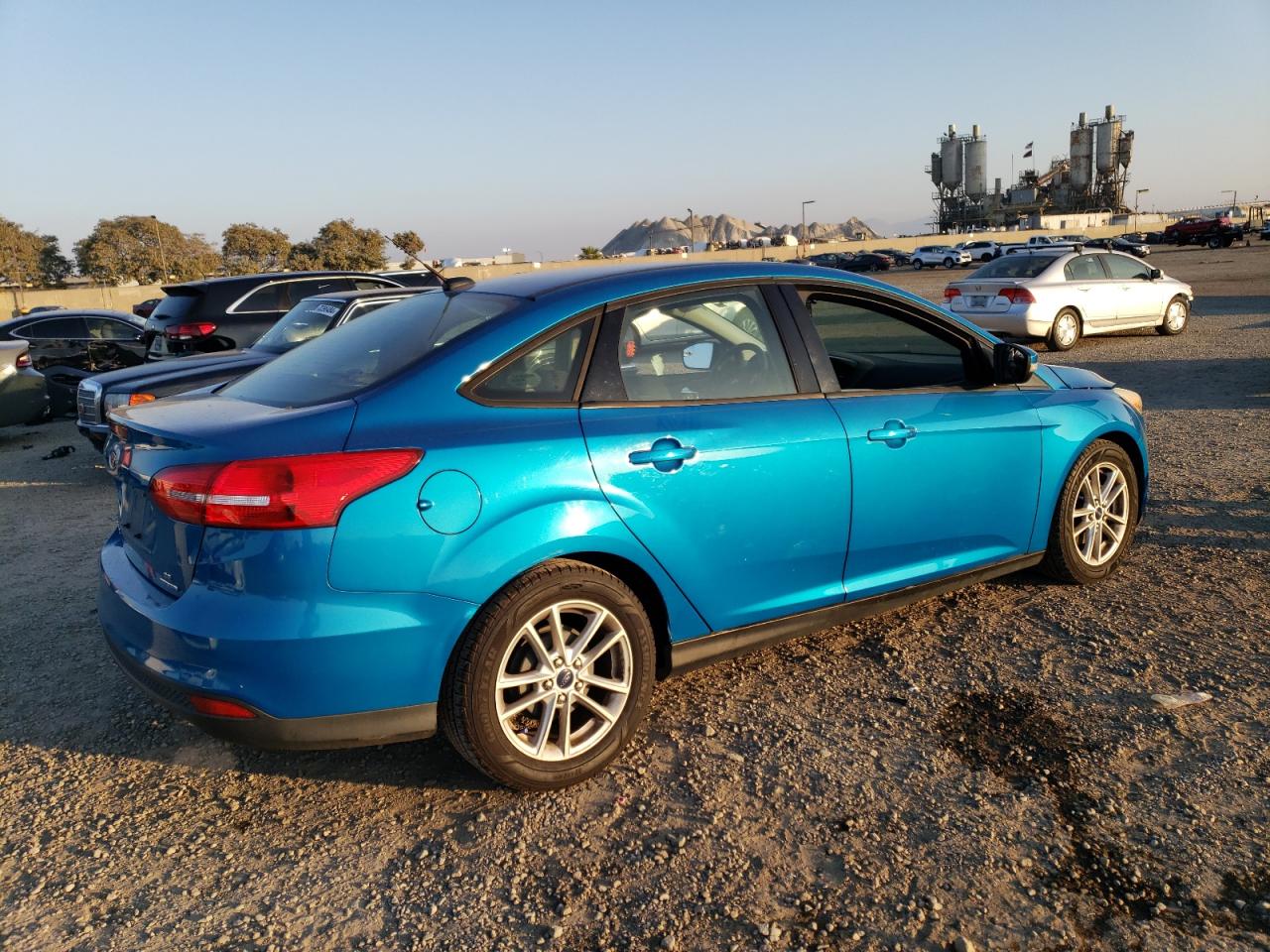 VIN 1FADP3F20FL228438 2015 FORD FOCUS no.3