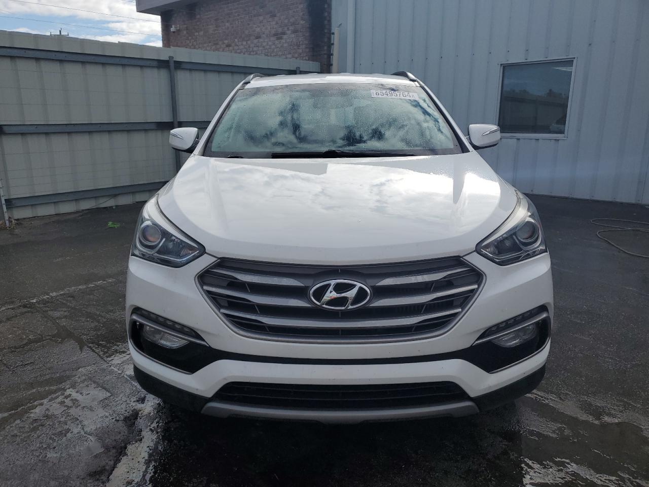 VIN 5NMZU4LA9JH061307 2018 HYUNDAI SANTA FE no.5