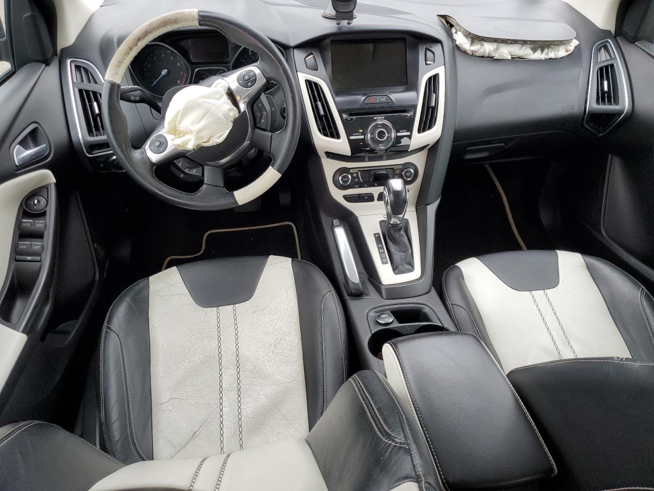 2012 Ford Focus Titanium VIN: 1FAHP3N29CL261856 Lot: 85870194