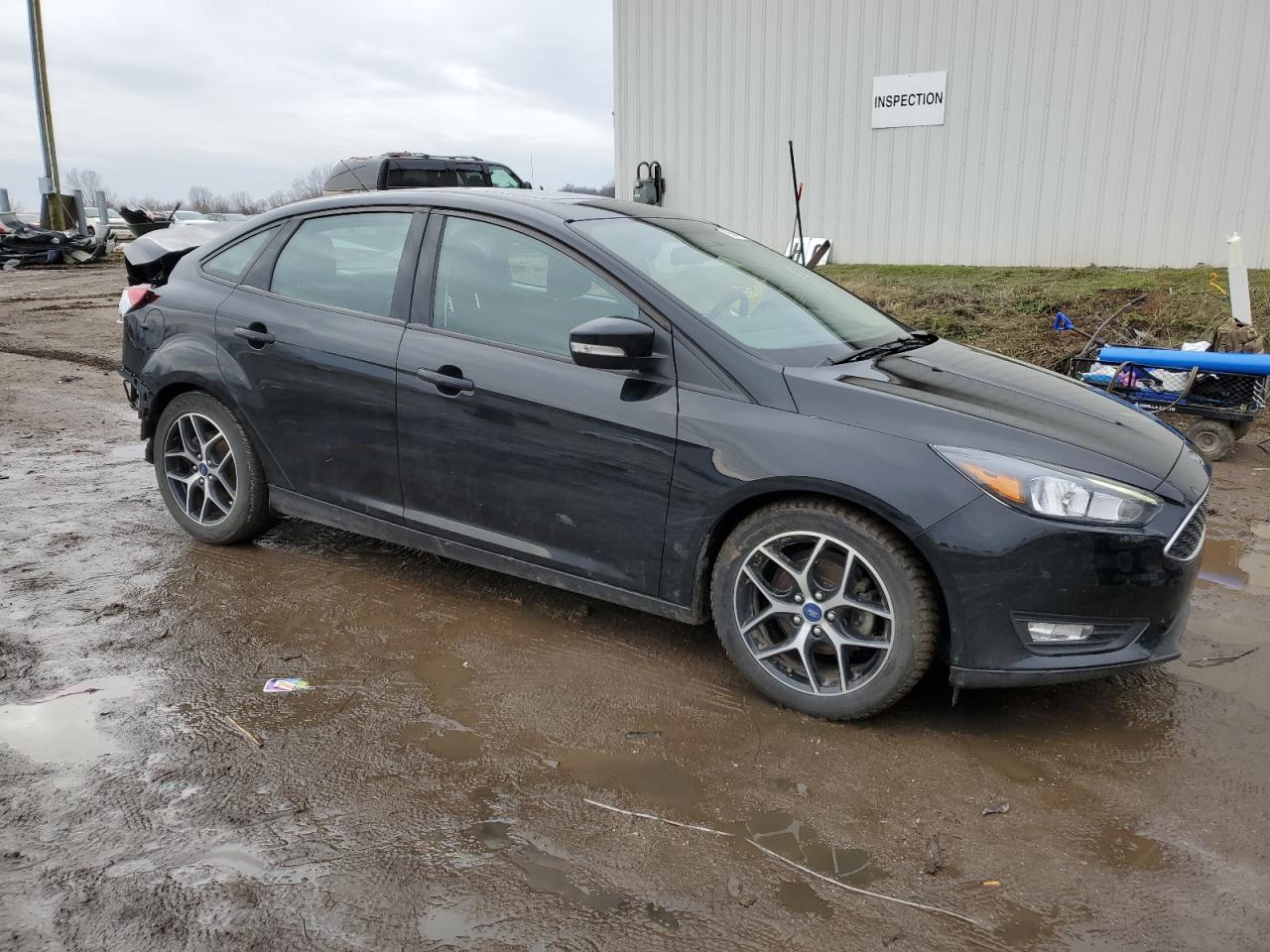 VIN 1FADP3H22JL239981 2018 FORD FOCUS no.4