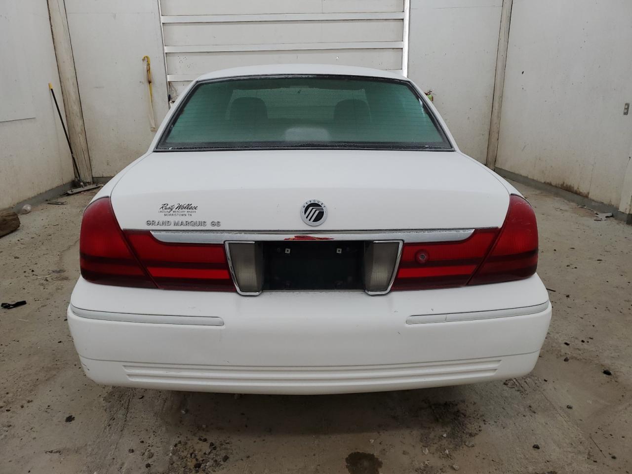 2004 Mercury Grand Marquis Gs VIN: 2MEFM74WX4X617028 Lot: 82819564