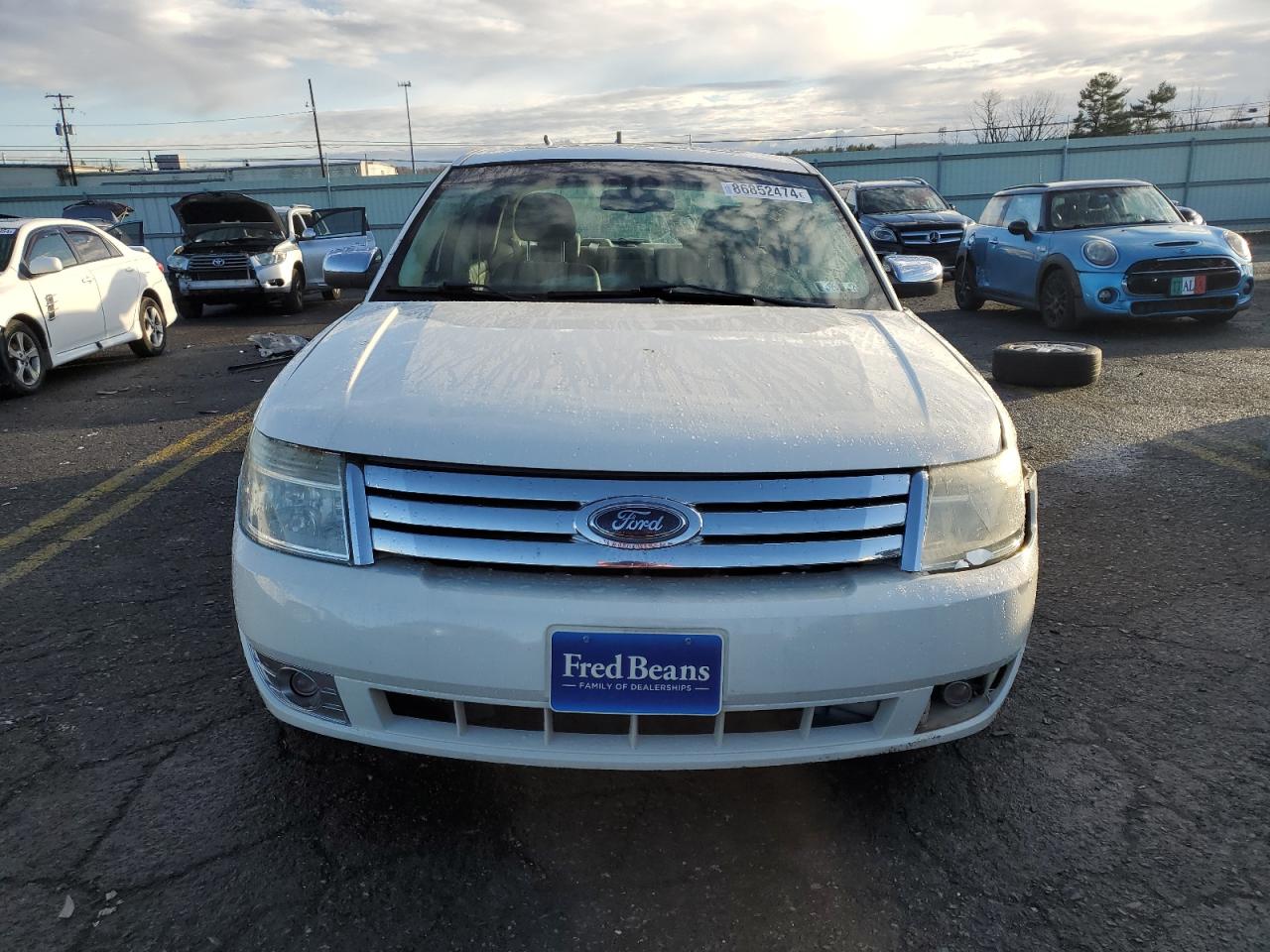 2009 Ford Taurus Limited VIN: 1FAHP25W49G117078 Lot: 86852474