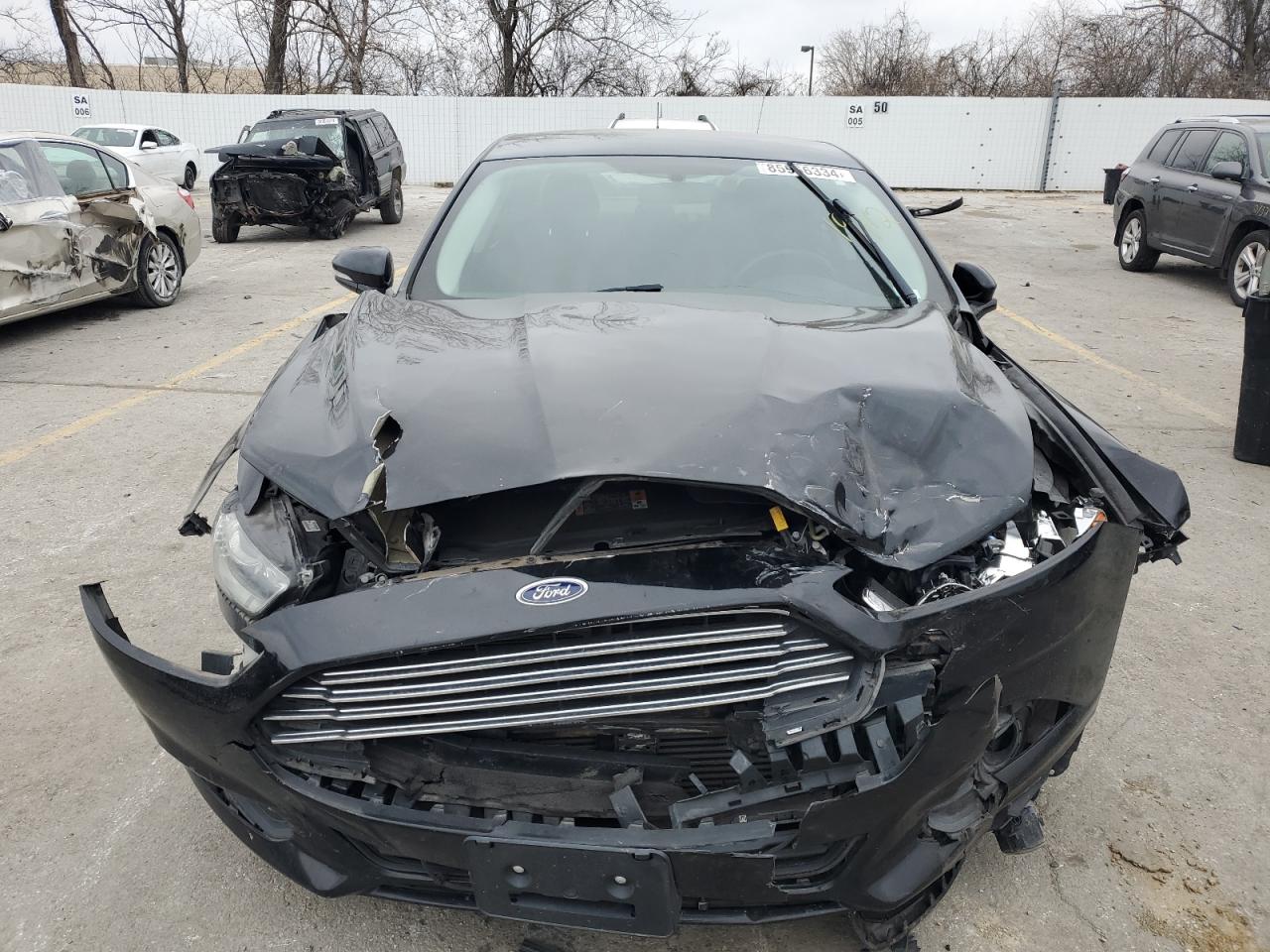 VIN 3FA6P0T90GR359882 2016 FORD FUSION no.5