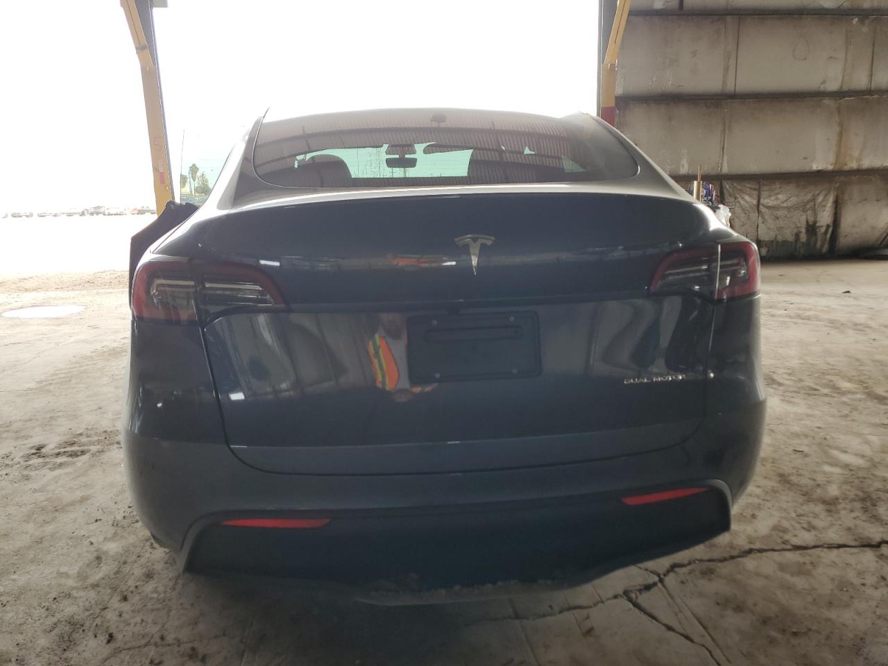 2023 Tesla Model Y VIN: 7SAYGDEE3PA098768 Lot: 84630194